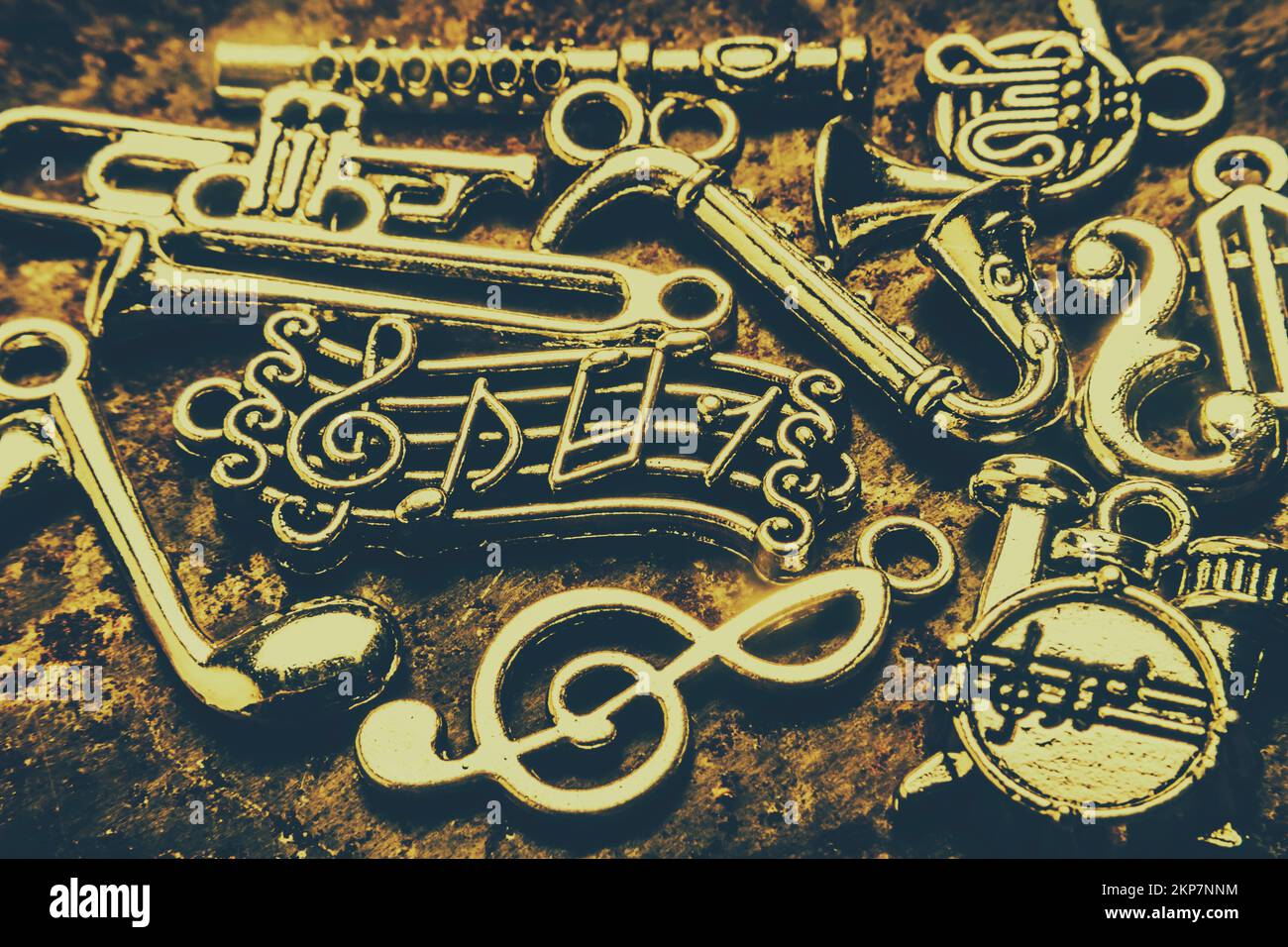 Antique toned artwork on a variety of music signs and symbols in poster play Stock Photo