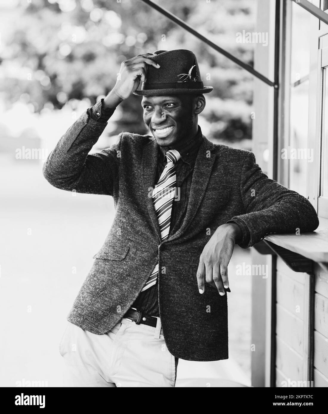 smiling cheerful african american man in suit and hat Stock Photo - Alamy