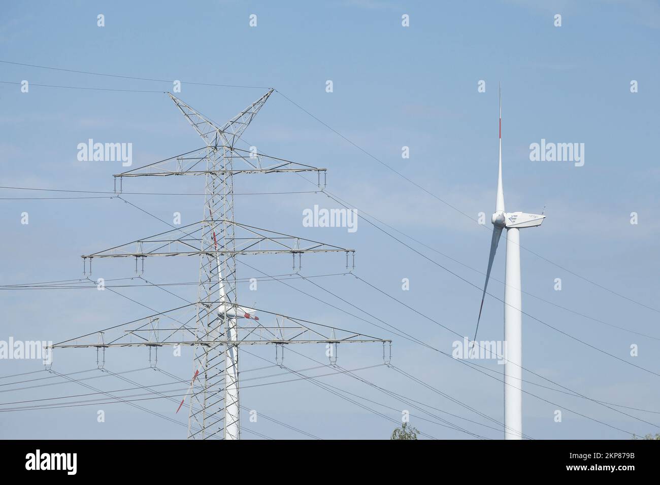 Wind turbines with power pole, Bremen, Germany Stock Photo