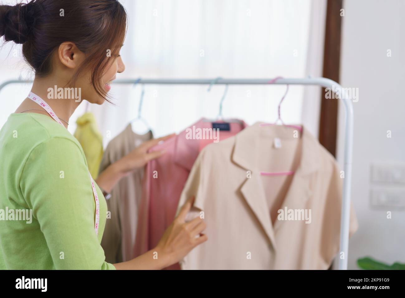 Fashion clothes online concept, Female designer checked new collection