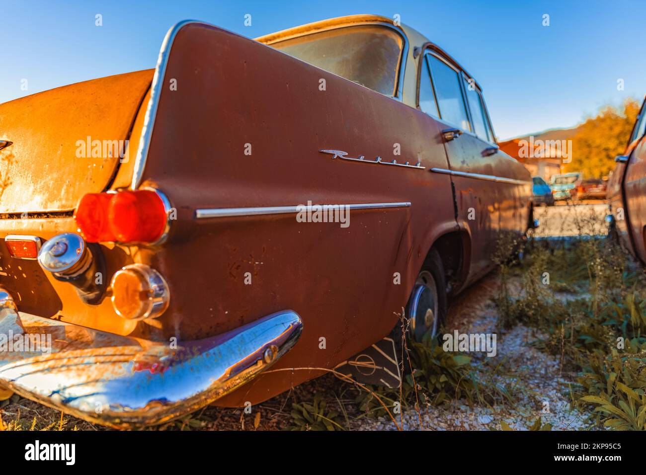 The Vintage Old Beautiful Opel Rekord Car Stay On The Dump Stock Photo the-vintage-old-beautiful-opel-rekord-car-stay-on-the-dump-stock-photo