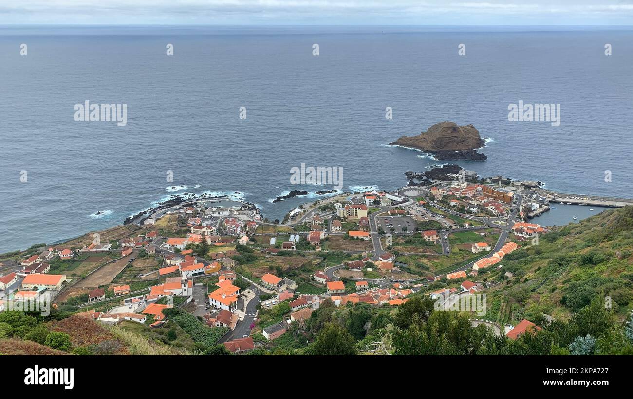 An aerial view of a seascape with the small fishing village of Canical on Madeira Island, Portugal Stock Photo