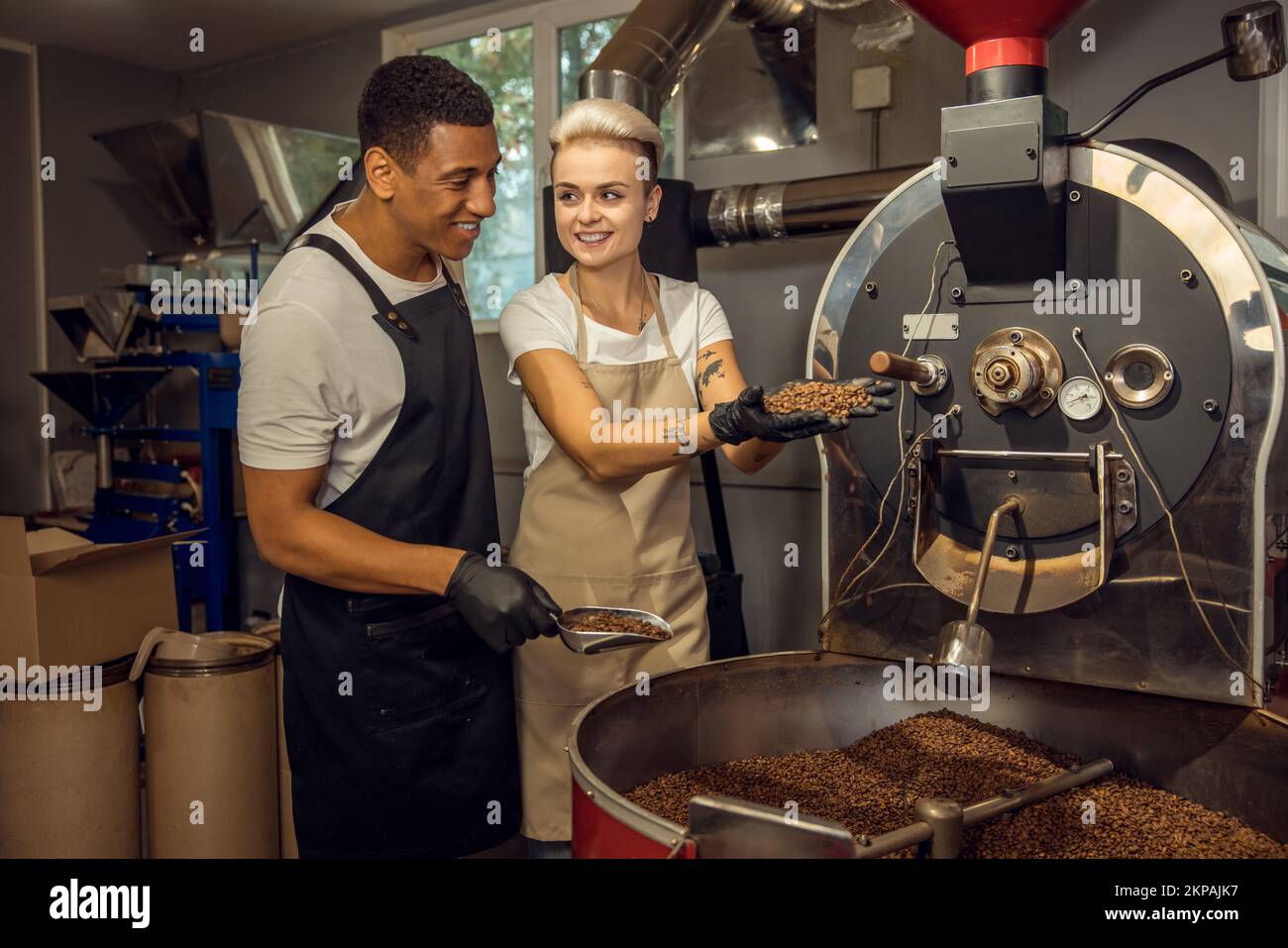 Two people working together in a small coffee company Stock Photo Alamy