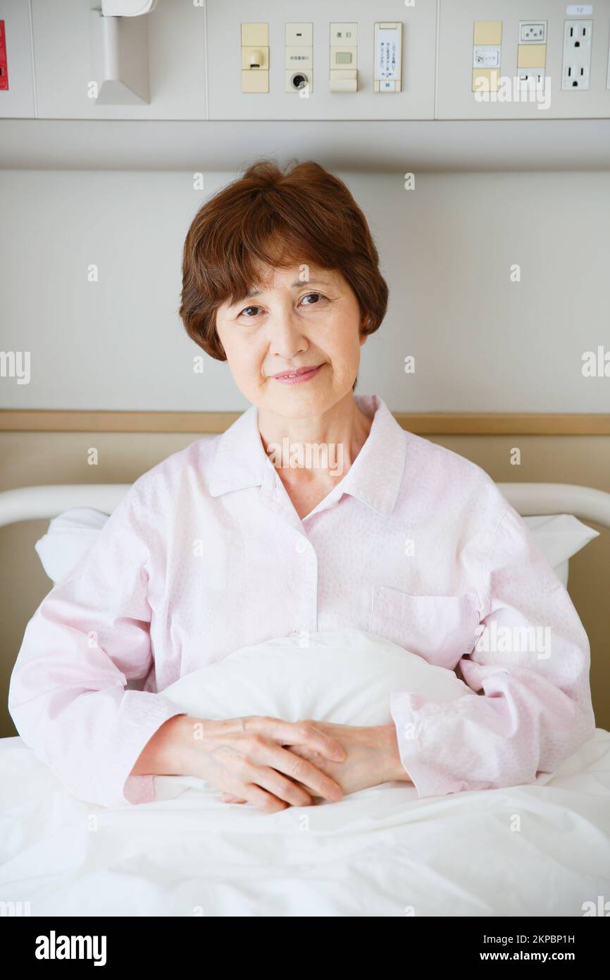 Senior Japanese woman in hospital room Stock Photo Alamy
