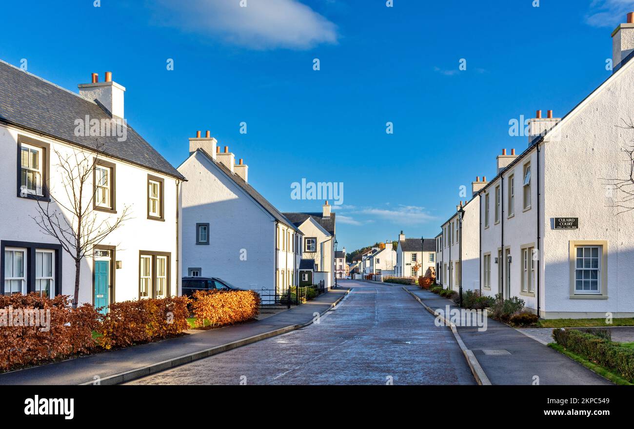 Tornagrain Inverness Scotland a planned village and the white houses of Hillhead Road Stock Photo