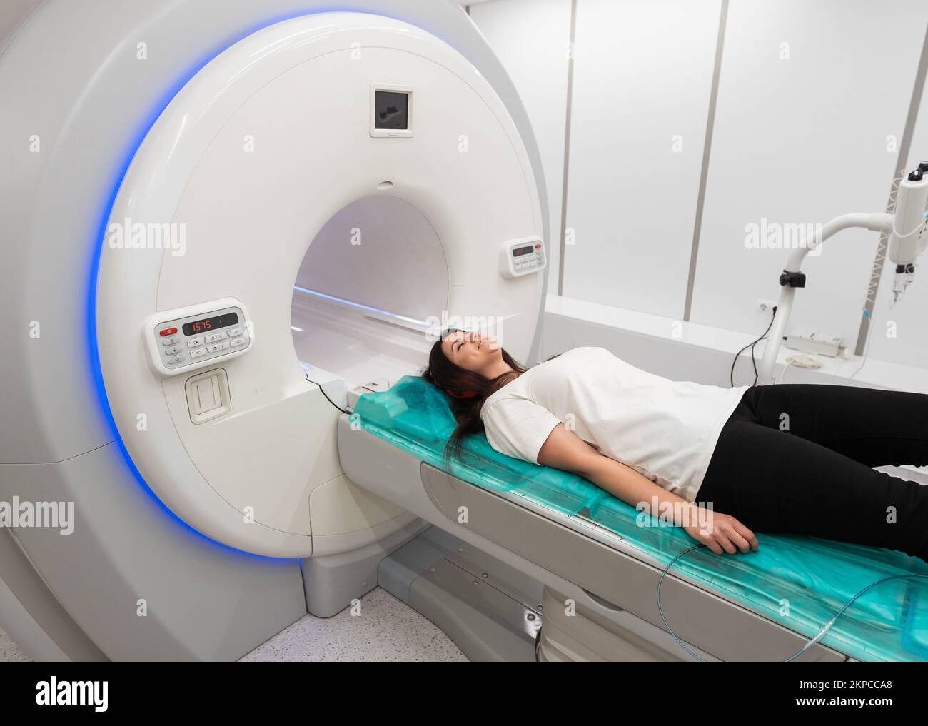 Female Patient Undergoing Mri Magnetic Resonance Imaging In Hospital Medical Equipment And 