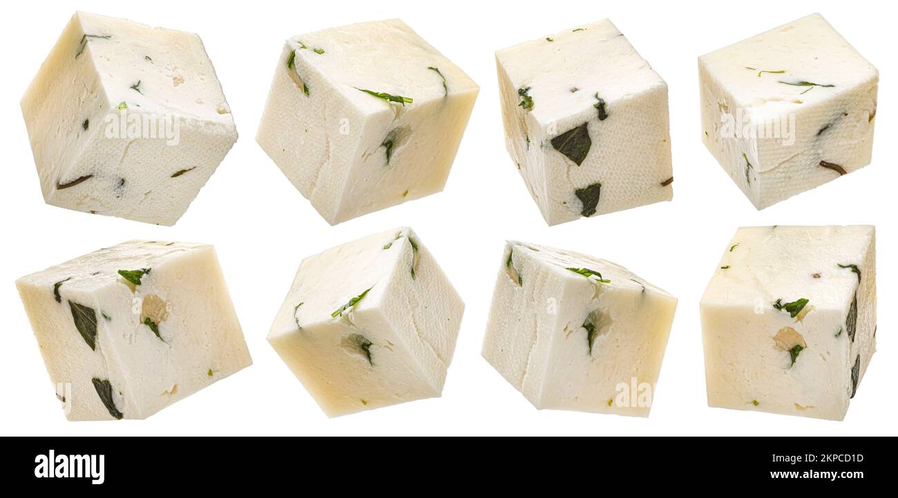 Sliced feta cubes, diced curd cheese pieces isolated on white