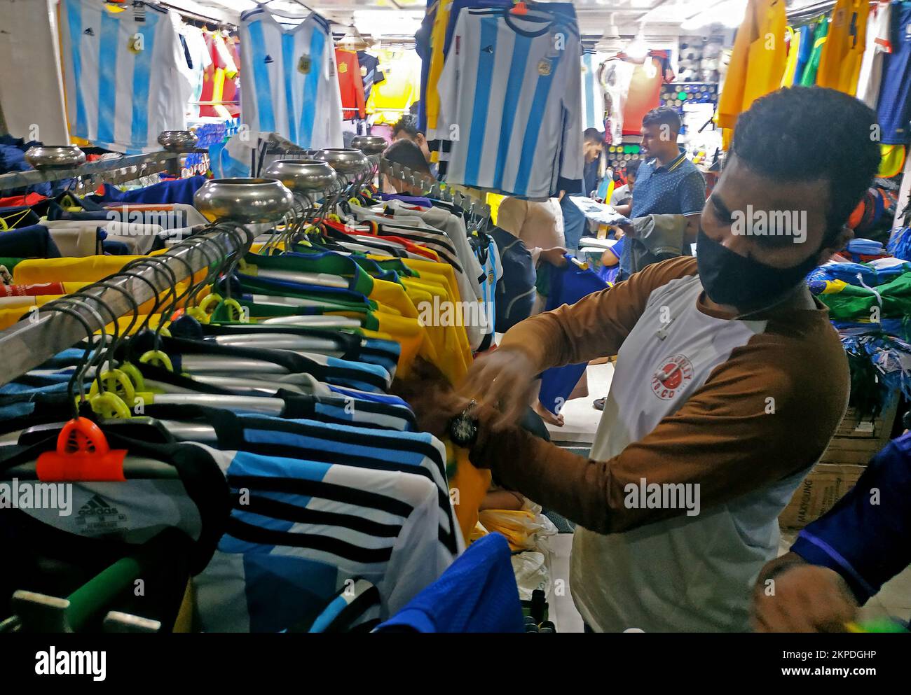 The shops in capital’s Gulistan have decked up with jerseys and flags of the participating nations, dominated by those of Argentina and Brazil, and ac Stock Photo