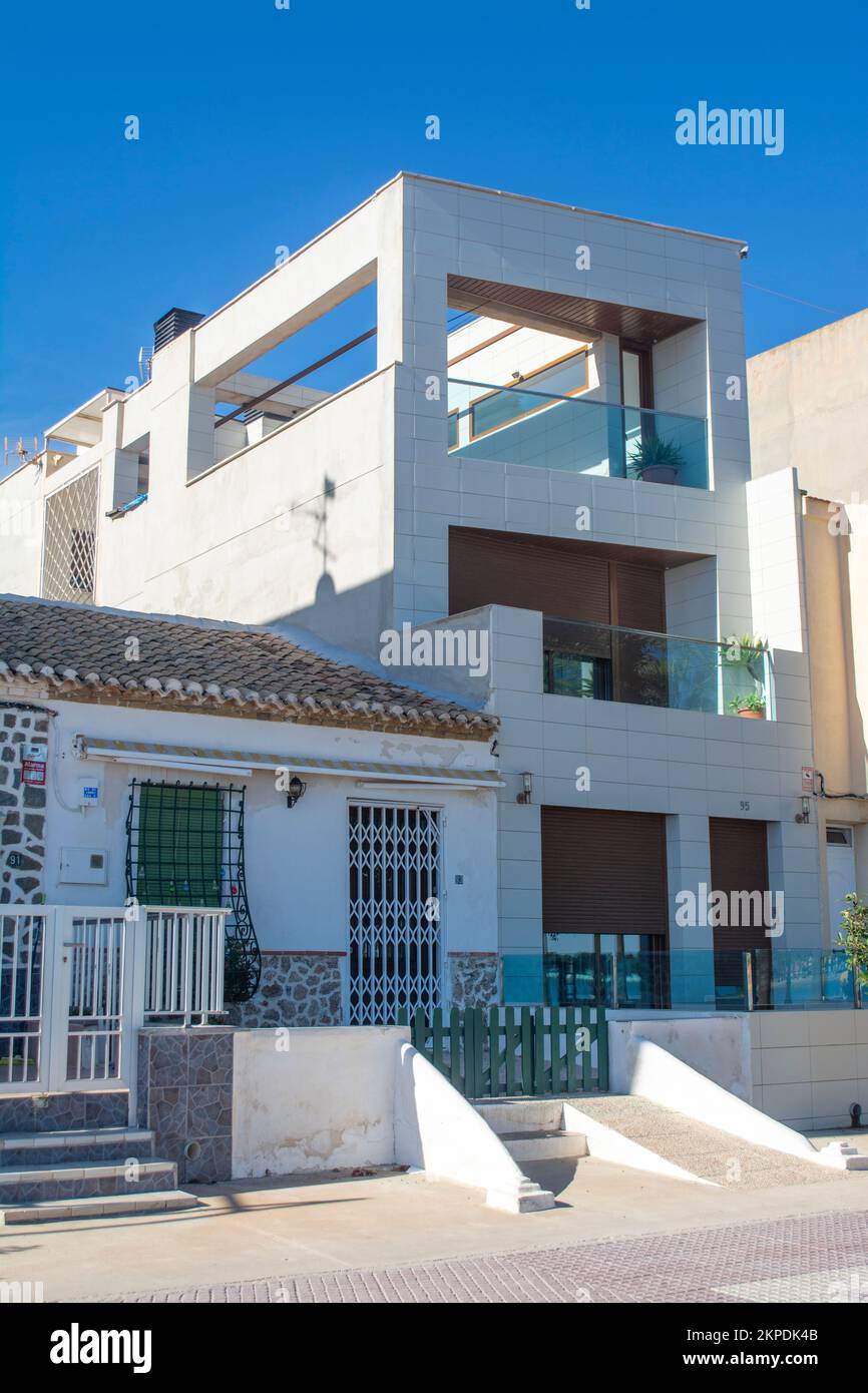 Modern and traditional apartment, villas side by side on the seafront of the Mar Menor in Los Alcazares in Murcia Spain Stock Photo