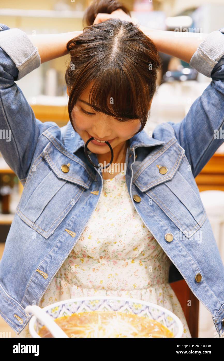 japanese-woman-eating-tantan-noodles-stock-photo-alamy
