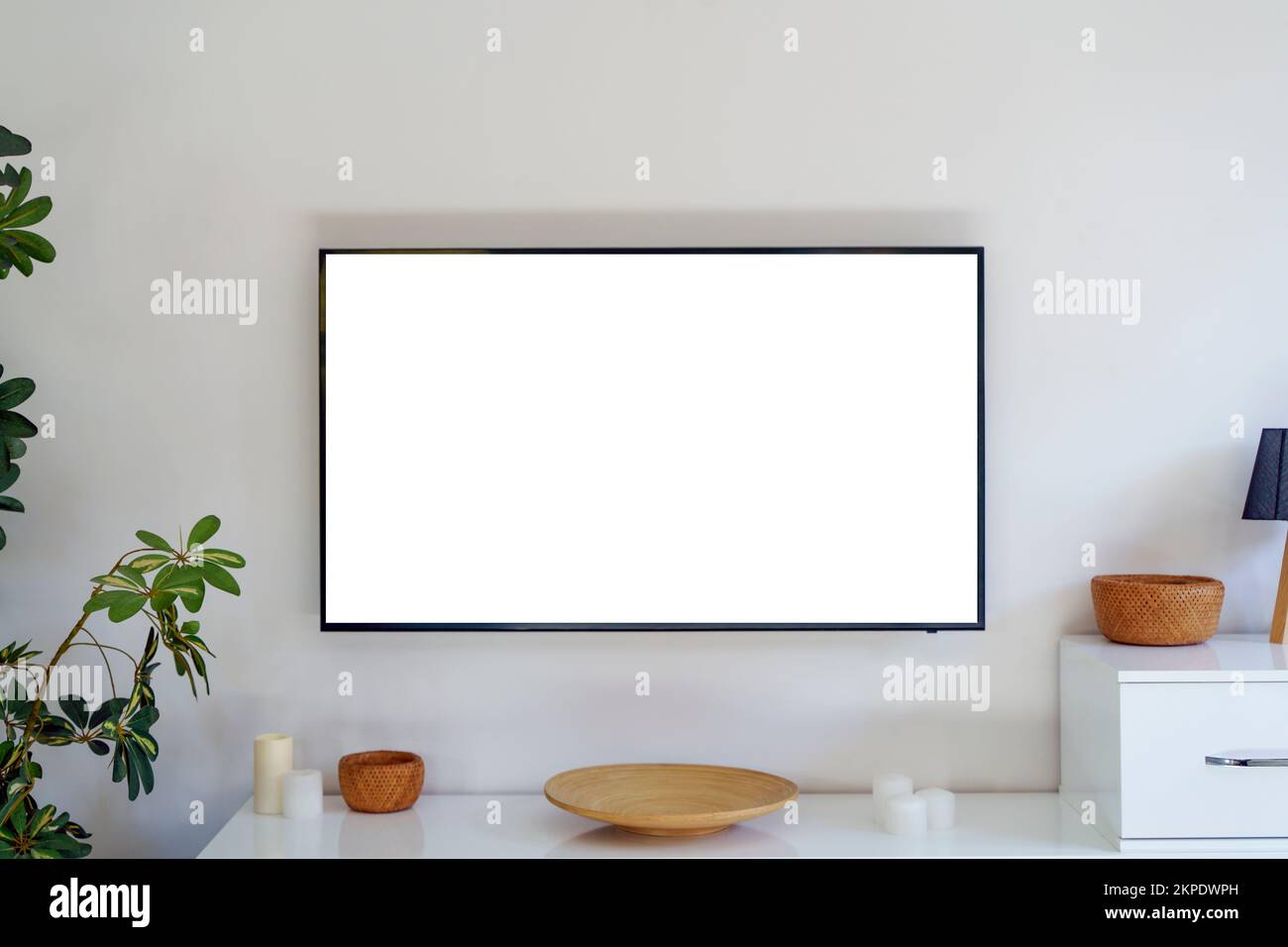 TV led mock up screen. Smart TV on a wall in an empty white interior living room. High quality photo Stock Photo