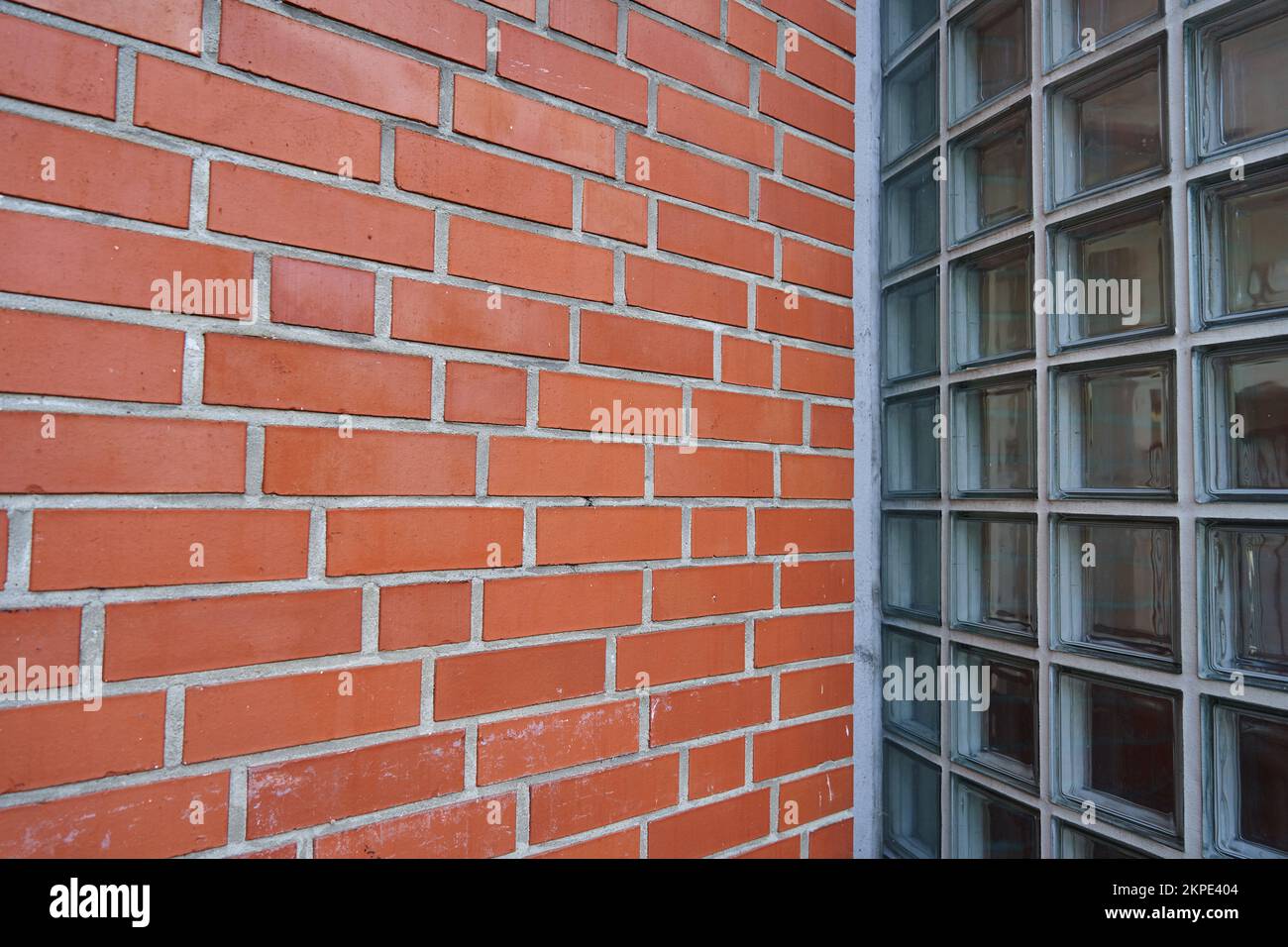 An orange brick wall texture background Stock Photo - Alamy