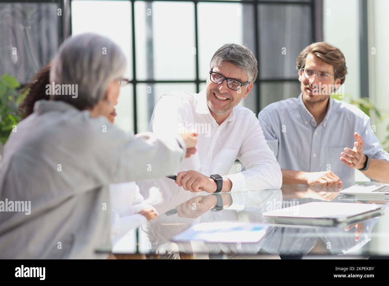 discussion of successful business people in the office Stock Photo