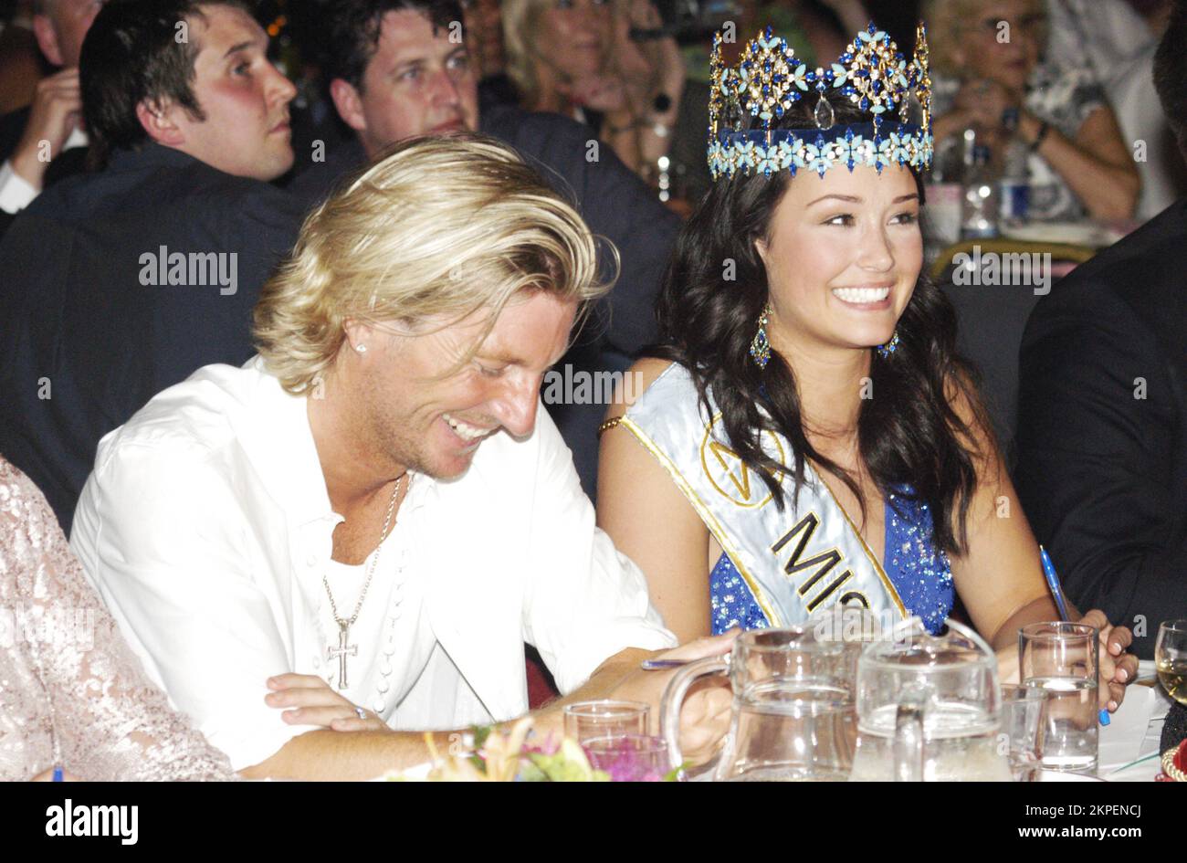 Judges footballer Robbie Savage with the reigning Miss World (Miss Iceland) Unnur Birna Vilhjalmsdottir at Miss Wales 2006 contest at the Coal Exchange in Cardiff, June 9 2006. Photograph: ROB WATKINS Stock Photo