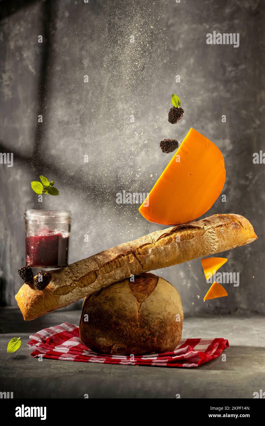 french cheese mimolette  with baguette and jam Stock Photo