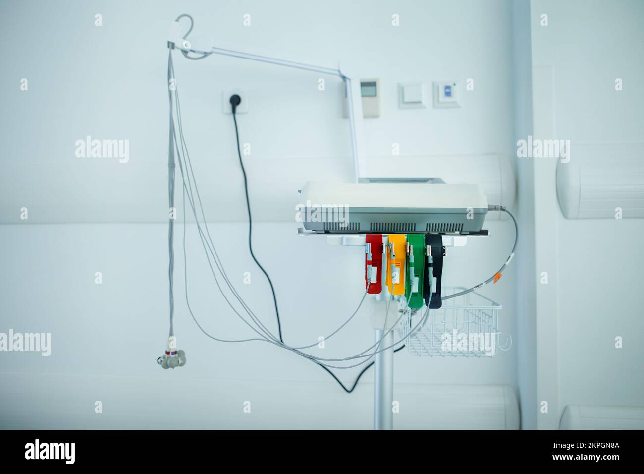 Close-up of EKG device in empty hospital room. Stock Photo