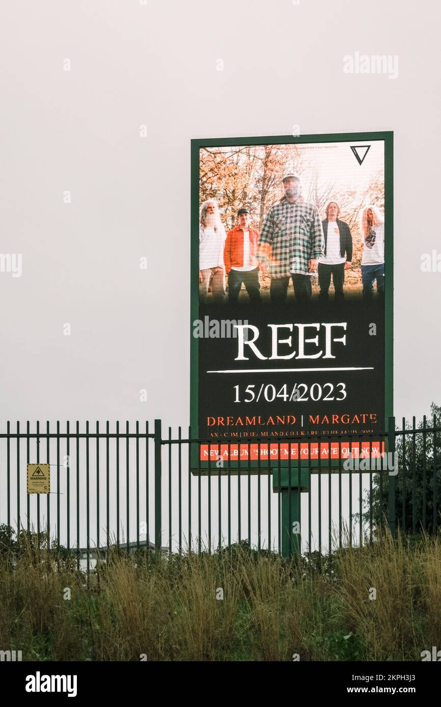Electronic Advertising Board or Screen, featuring Reef at Dreamland, Margate, Kent, UK. Stock Photo
