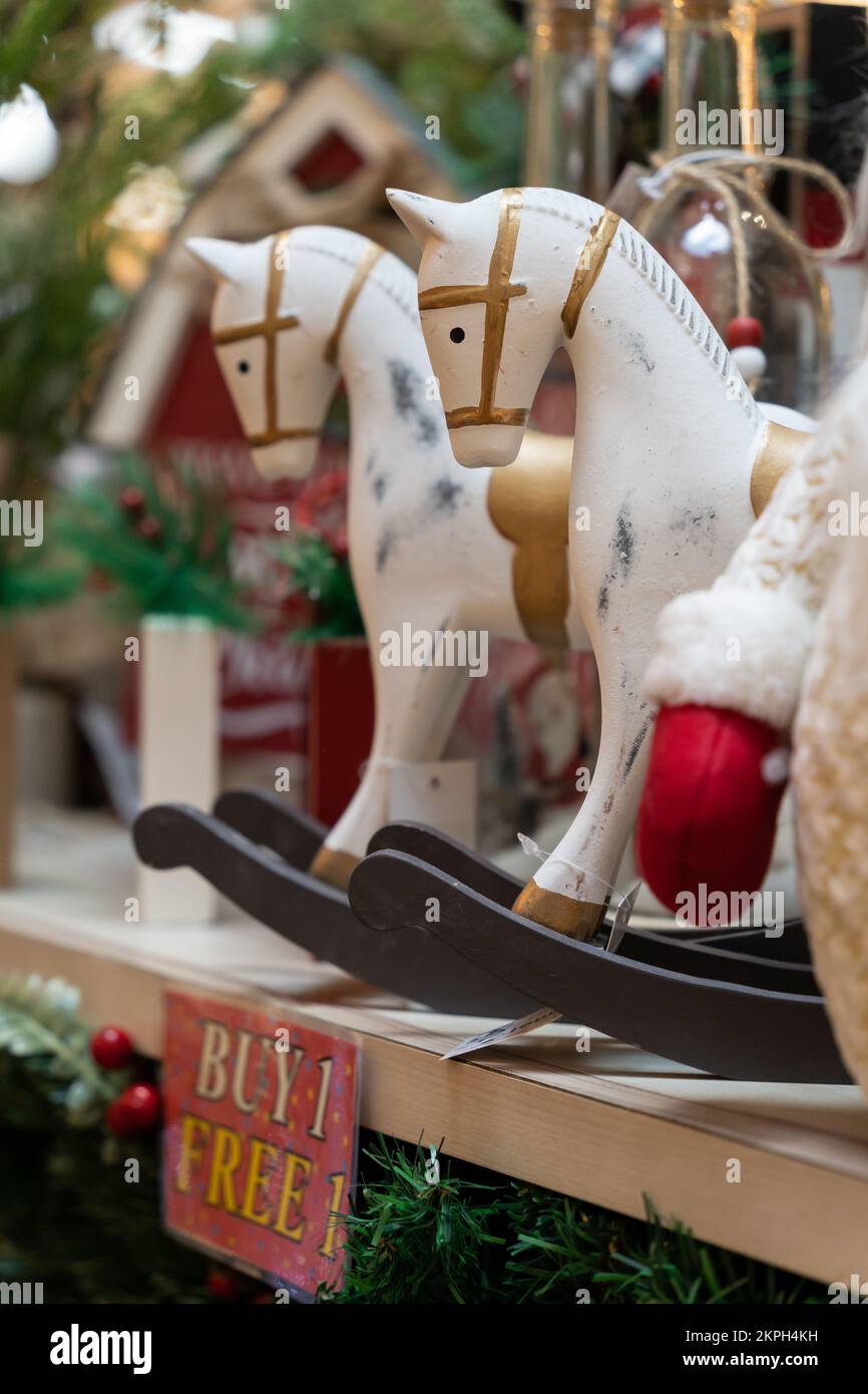 Close-up view of the wooden rocking horses decoration selling at the Christmas market. Stock Photo
