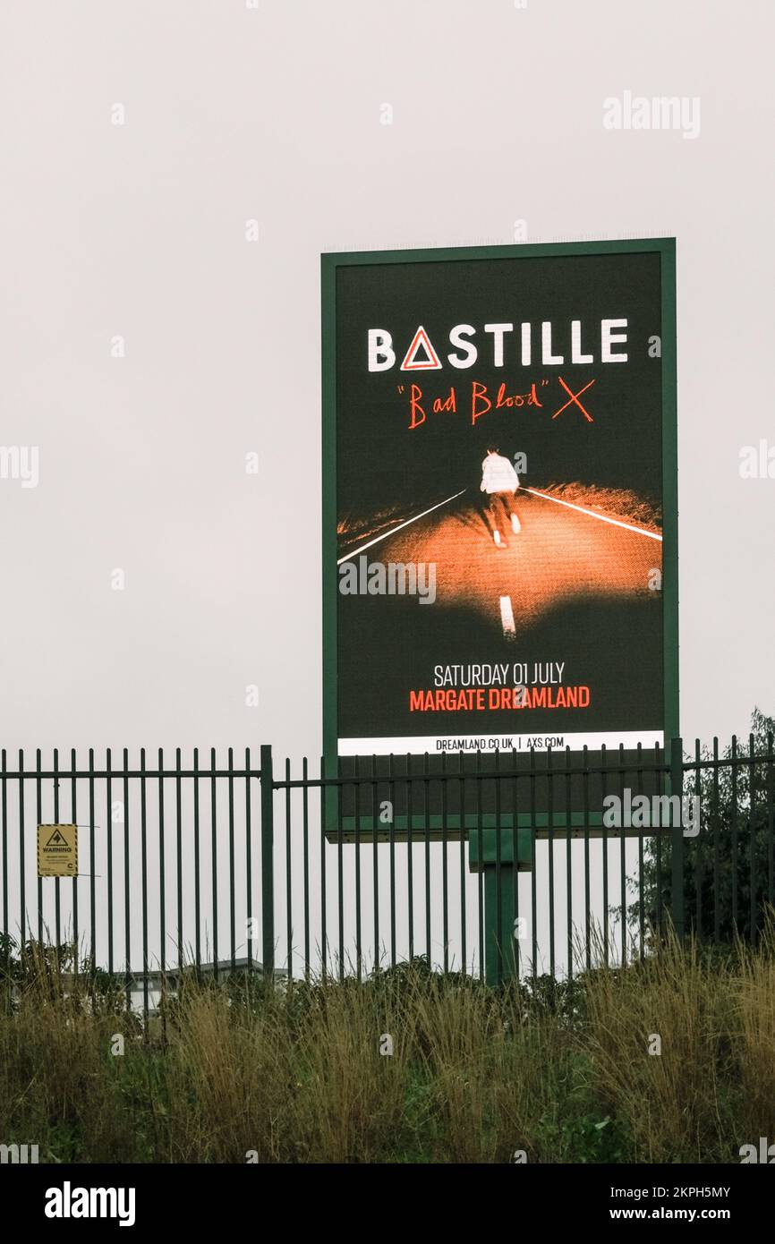 Electronic Advertising Board or Screen, featuring Bastille Bad Blood at Dreamland, Margate, Kent, UK. Stock Photo