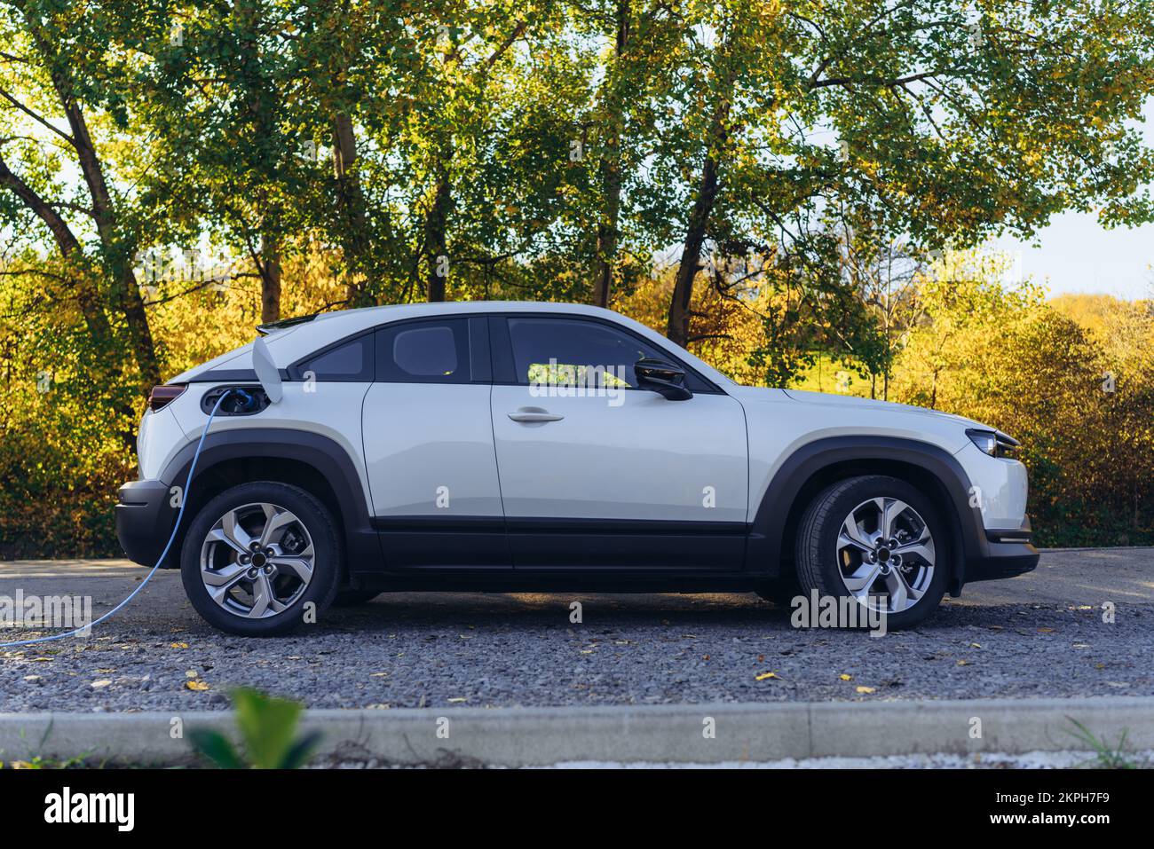 charging-an-electric-car-in-home-sustainable-transportation-concept