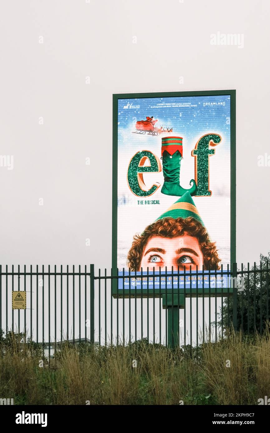 Electronic Advertising Board or Screen, featuring Elf The Musical at Dreamland, Margate, Kent, UK. Stock Photo