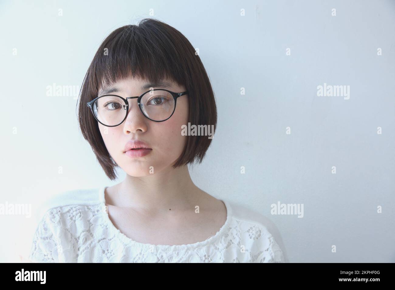 Young Japanese woman wearing glasses Stock Photo Alamy