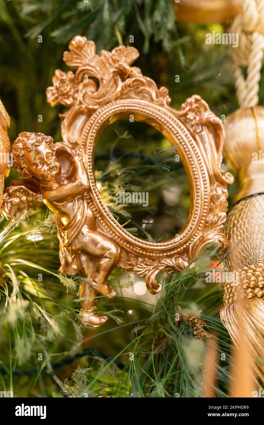 Close-up view of the Christmas ornaments hanging on the Christmas tree. Stock Photo