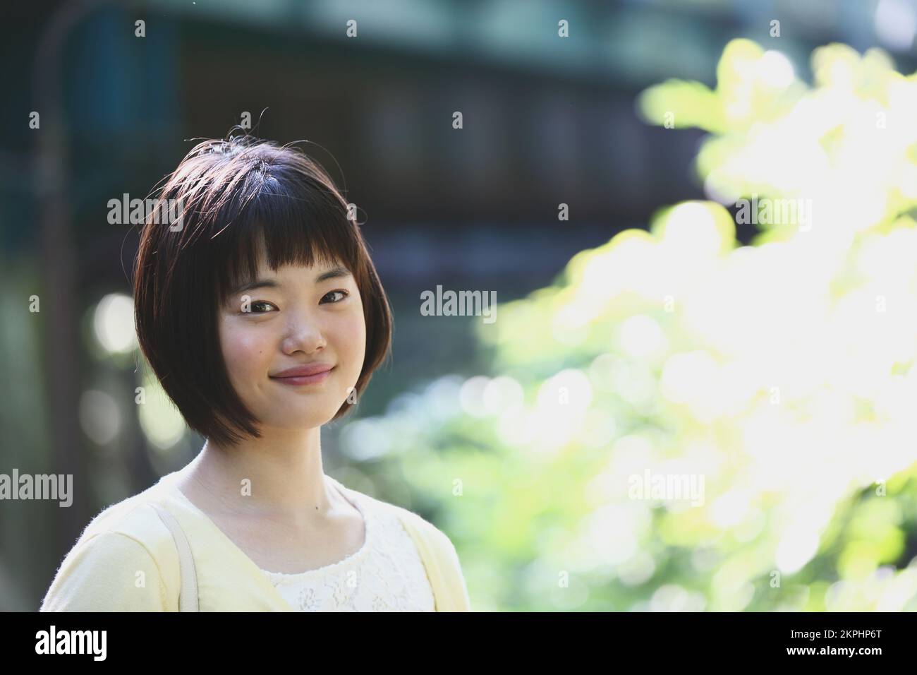 Young Japanese woman taking a walk Stock Photo - Alamy