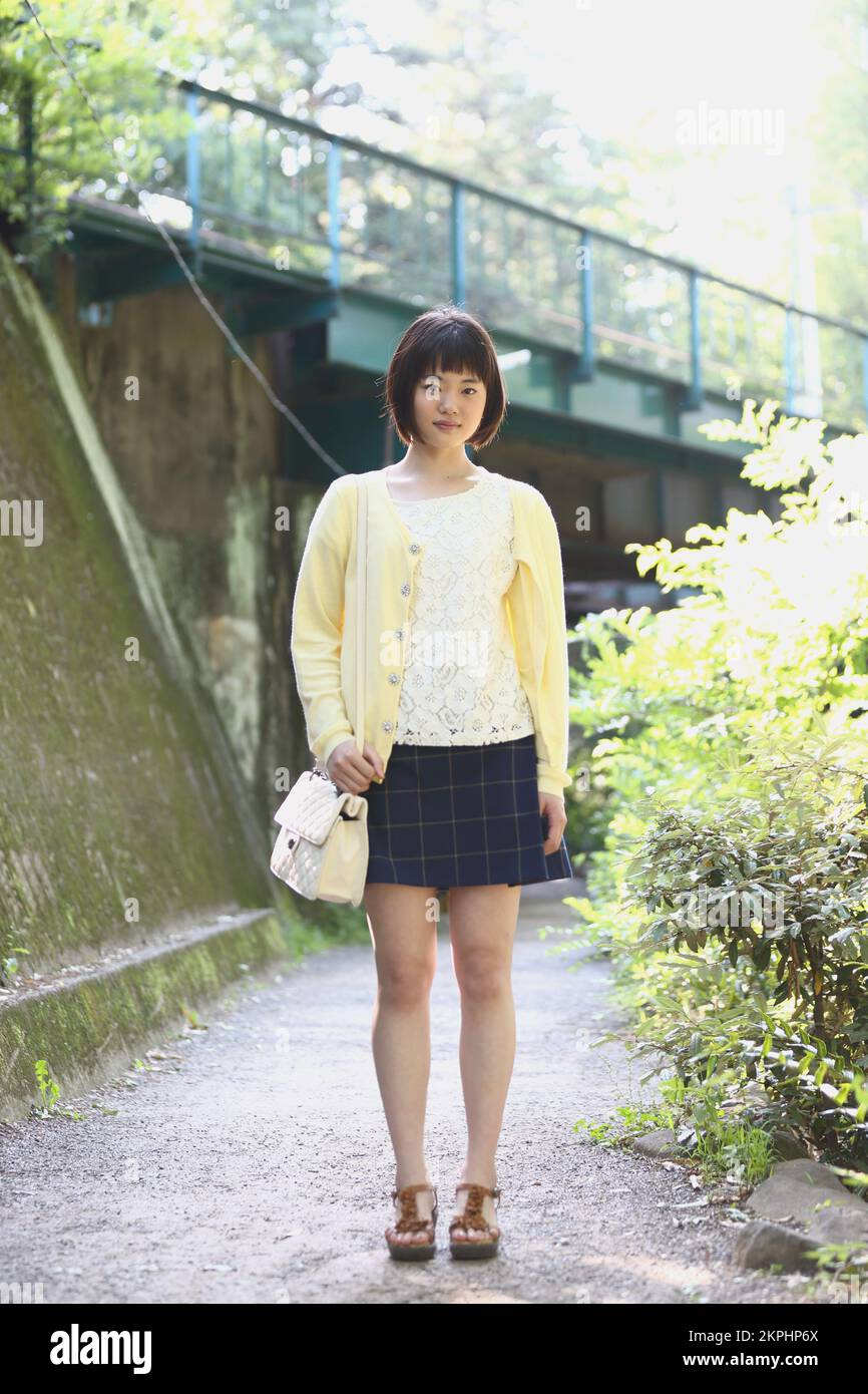 Young Japanese woman taking a walk Stock Photo - Alamy