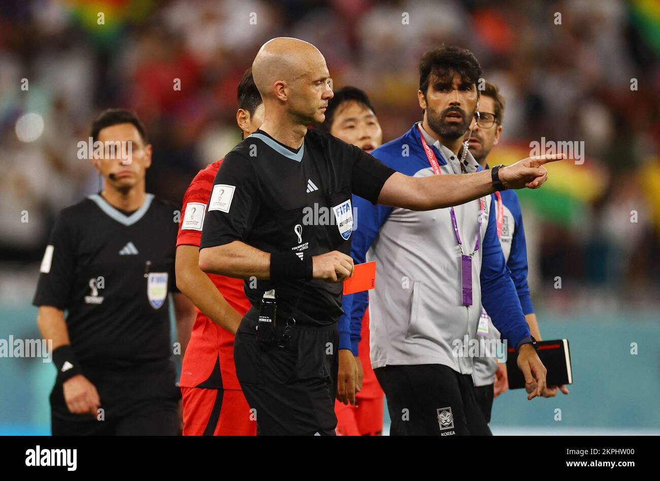 Soccer Football - FIFA World Cup Qatar 2022 - Group H - South Korea v Ghana  - Education City Stadium, Al Rayyan, Qatar - November 28, 2022 Referee  Anthony Taylor shows South
