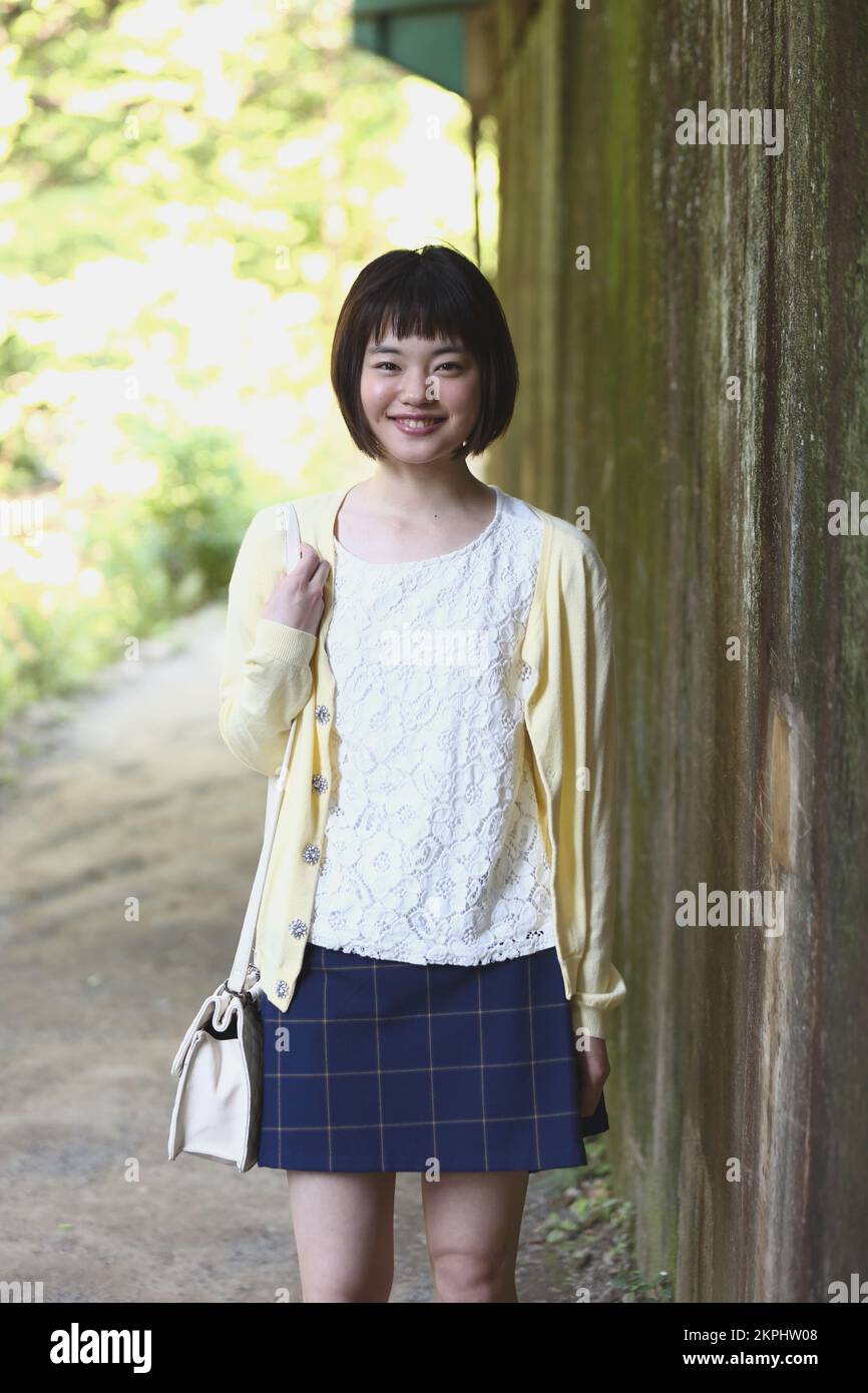 Young Japanese woman taking a walk Stock Photo - Alamy