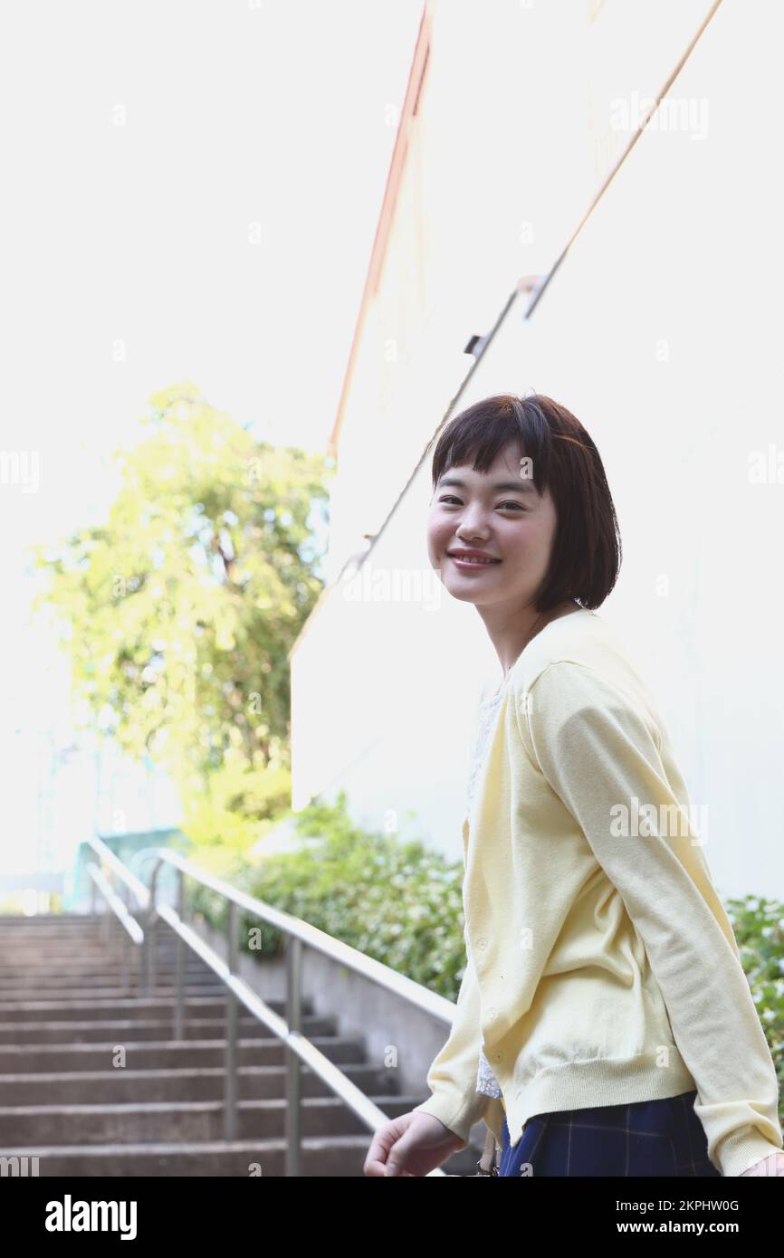 Young Japanese woman taking a walk Stock Photo - Alamy