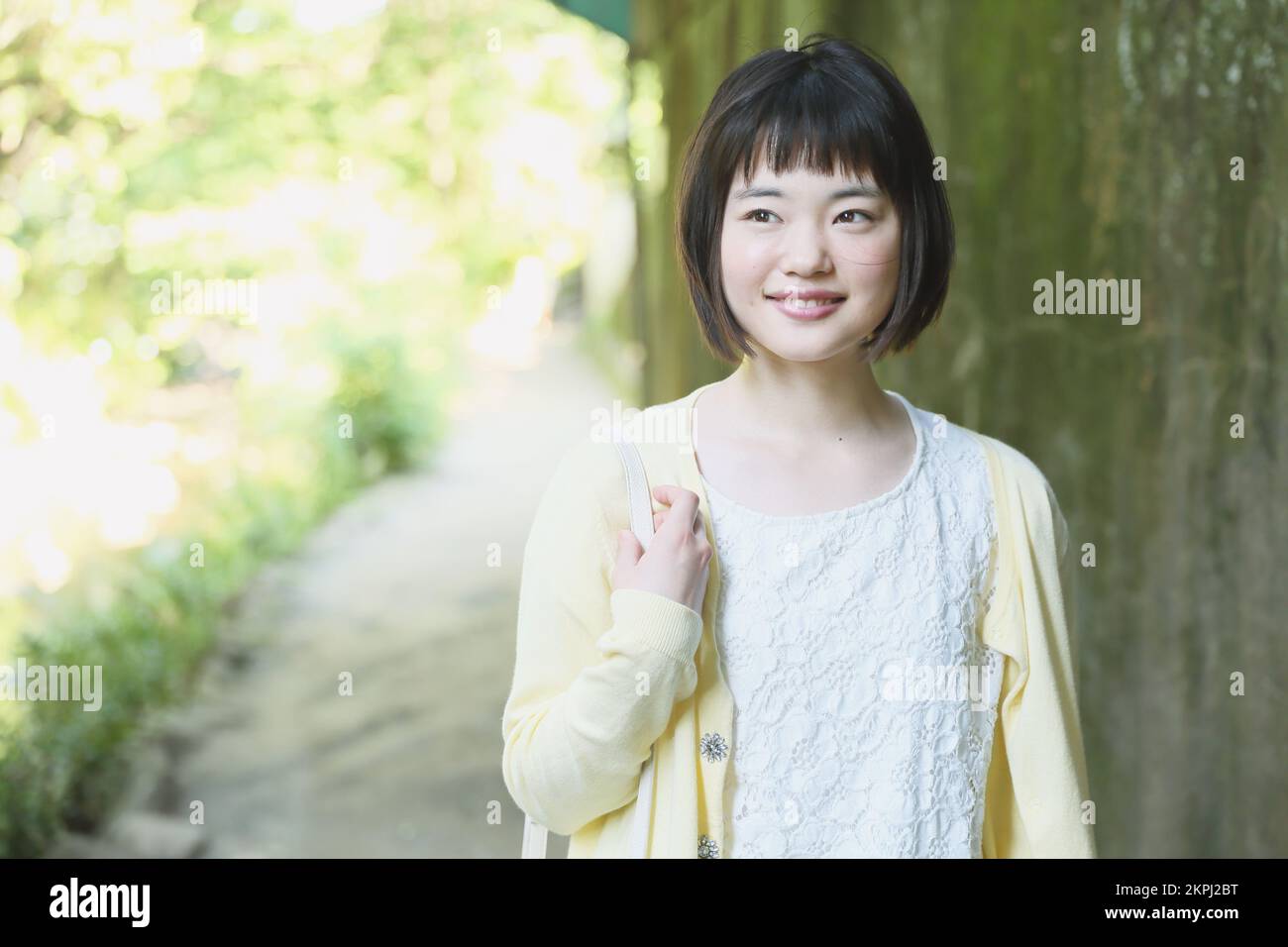 Young Japanese woman taking a walk Stock Photo - Alamy