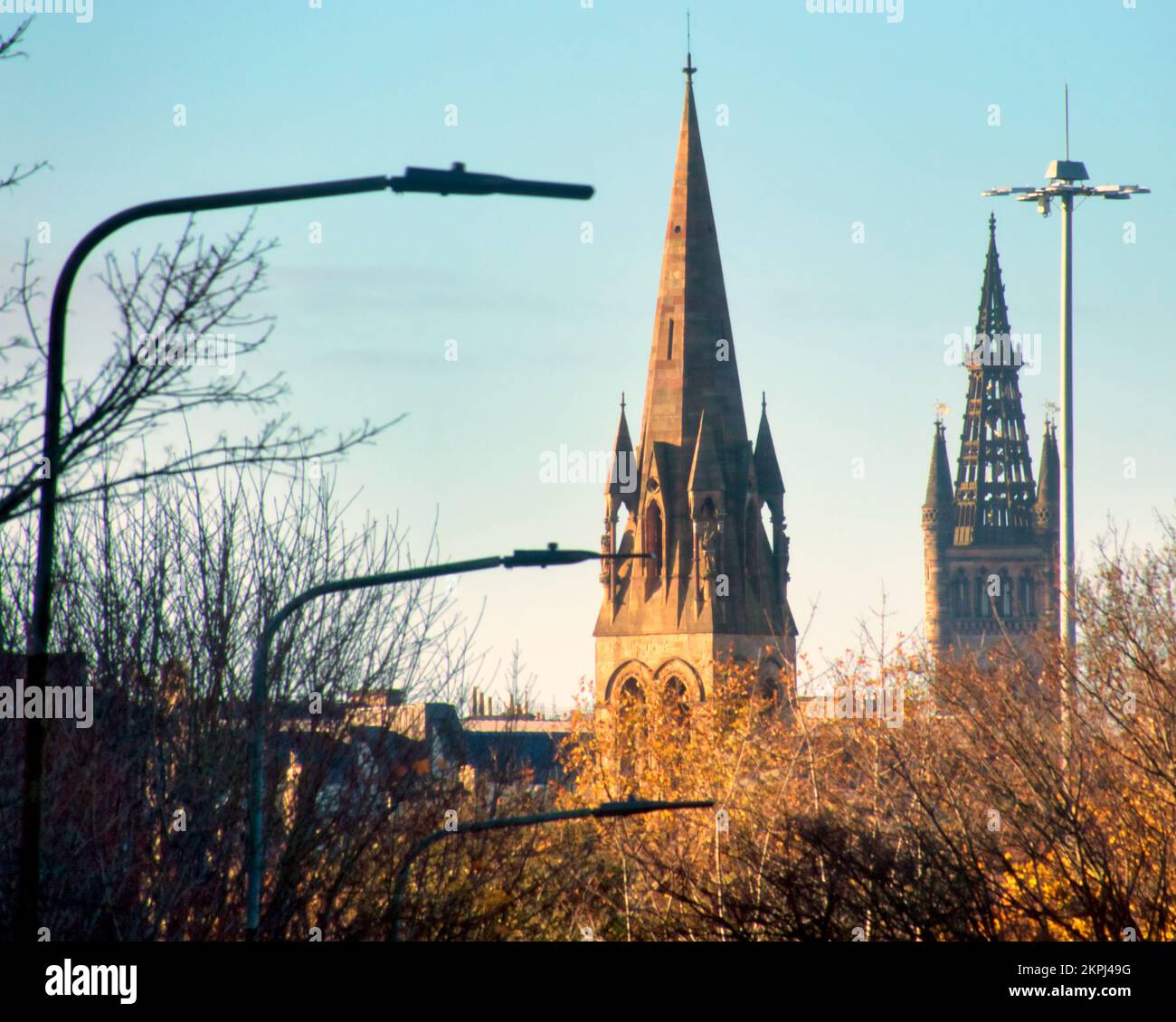 Two towers skyline of Free Presbyterian Church of Scotland  Church 137 Woodlands Rd, Glasgow, G3 6LE and the university of glasgow tower Stock Photo