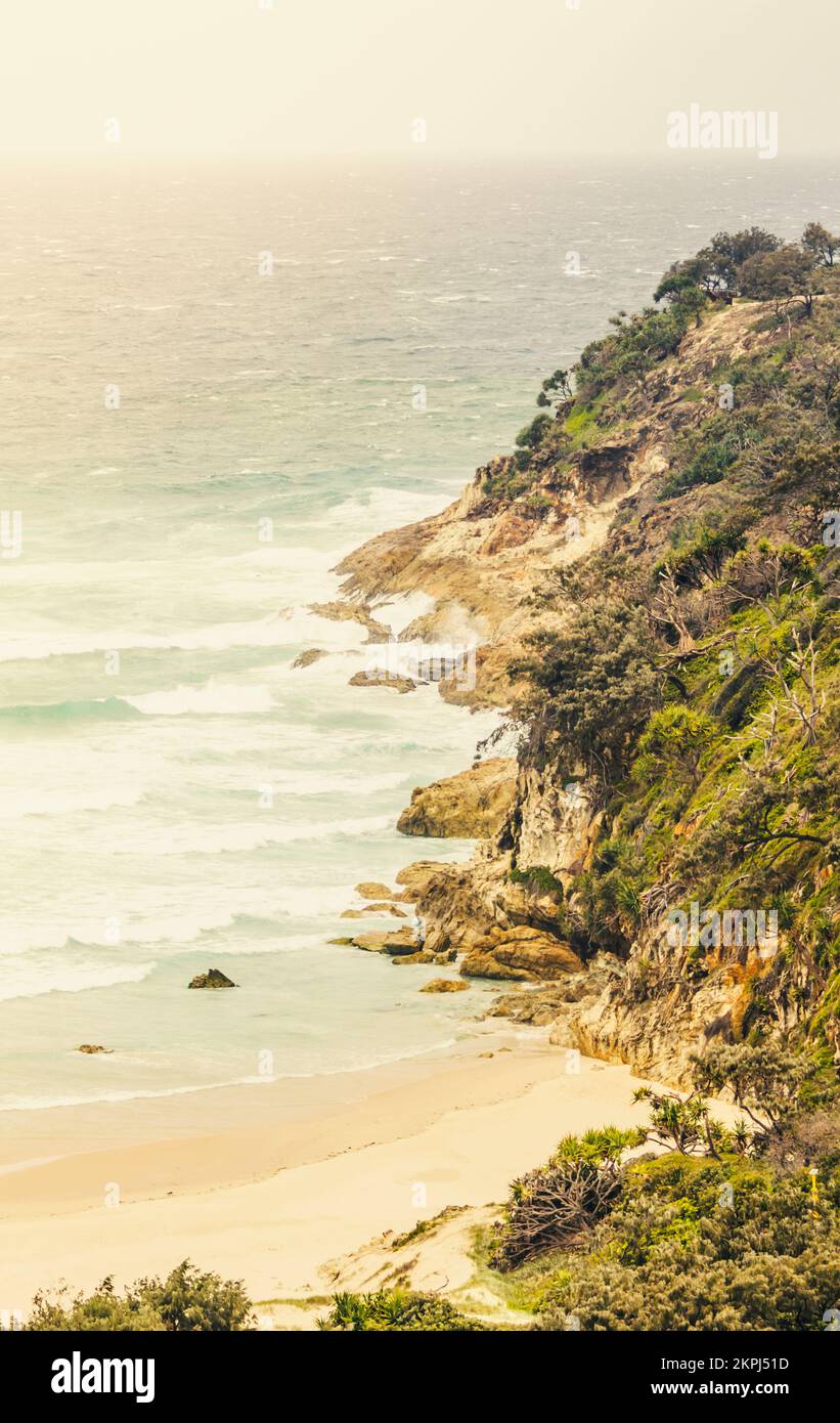 Vintage island cape in calming coastal colours with wave wash and