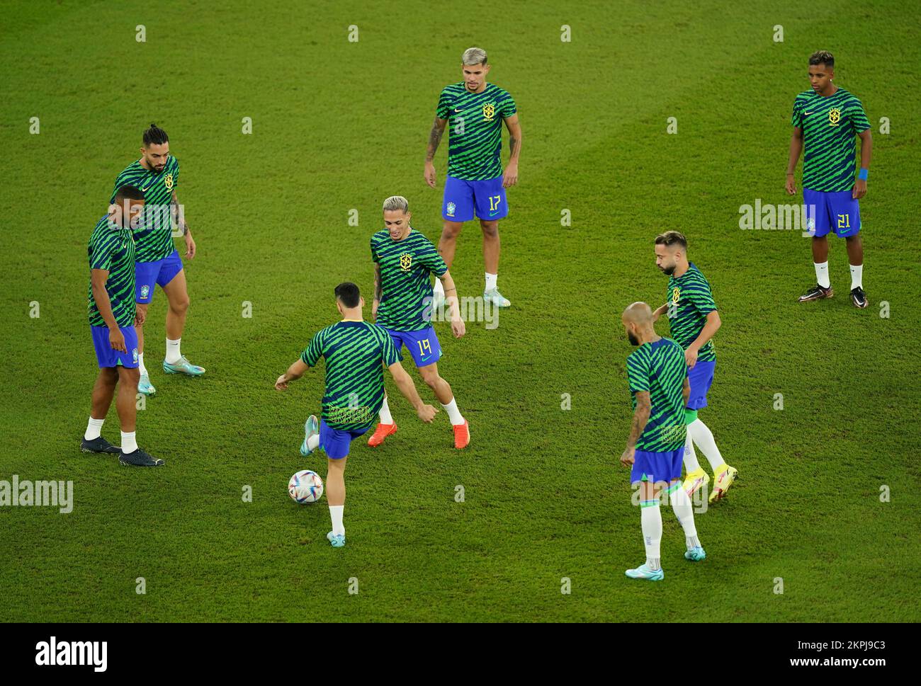 Brazil players warming up before the FIFA World Cup Group G match at Stadium 974 in Doha, Qatar
