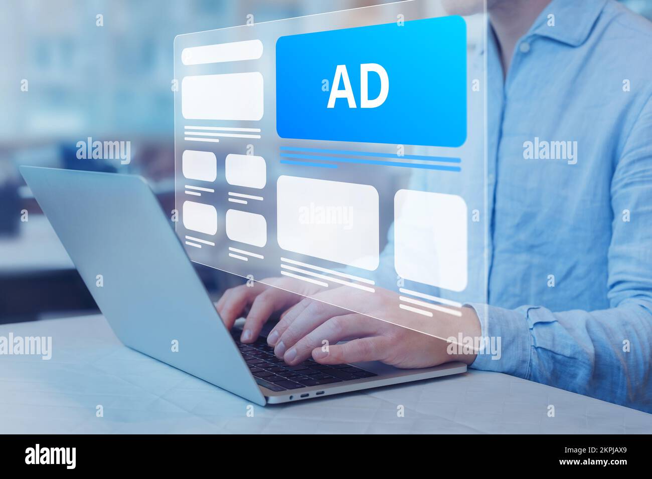 Programmatic in-feed advertisement on computer screen. Person viewing website with inbound ads to optimize click through rate and conversion. Digital Stock Photo