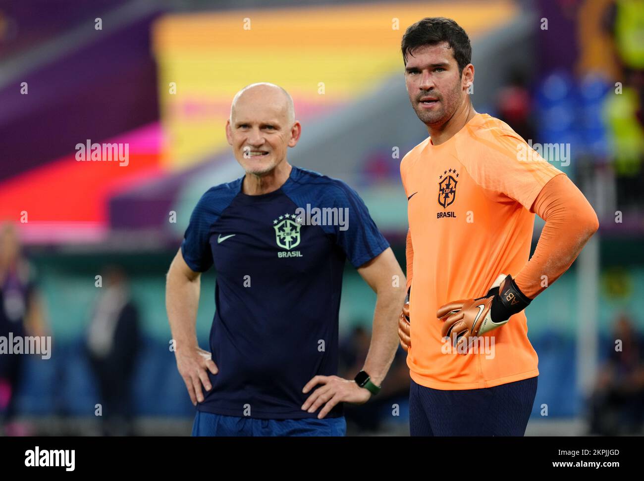 Brazil goalkeeper Alisson (right) with goalkeeping coach Claudio Taffarel before the FIFA World Cup Group G match at Stadium 974 in Doha, Qatar. Picture date: Monday November 28, 2022. Stock Photo