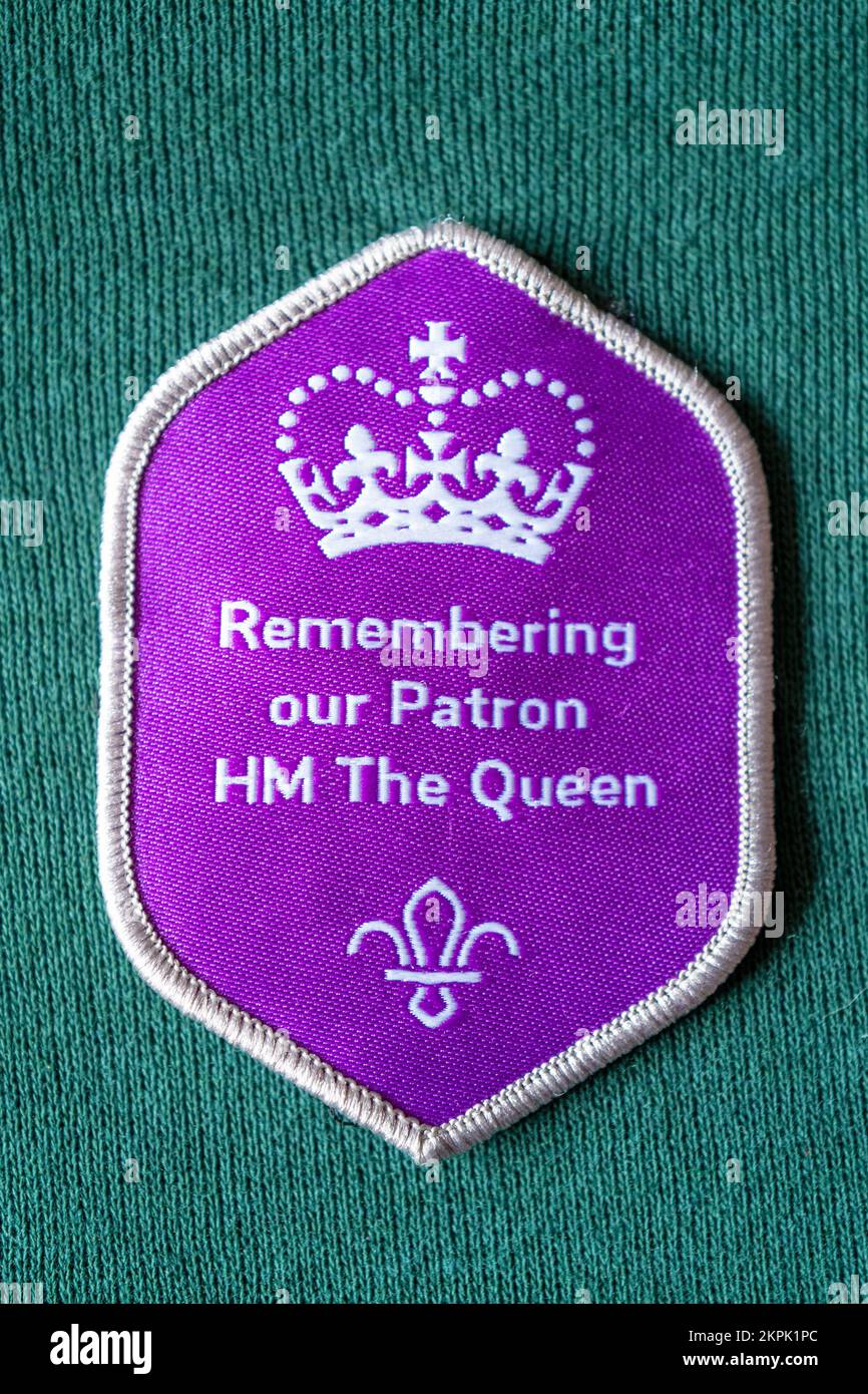 Southampton, UK - 13th November 2022: A Cub scout badge created in remembrance of Queen Elizabeth II following the death of Her Majesty in 2022. Stock Photo