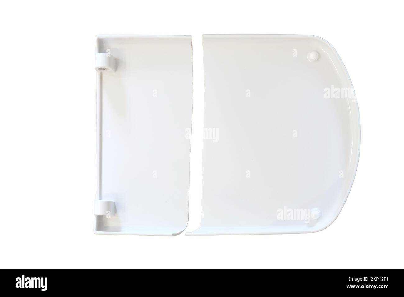 Cracked white toilet lid, isolated on a white background. A broken closing lid in the home