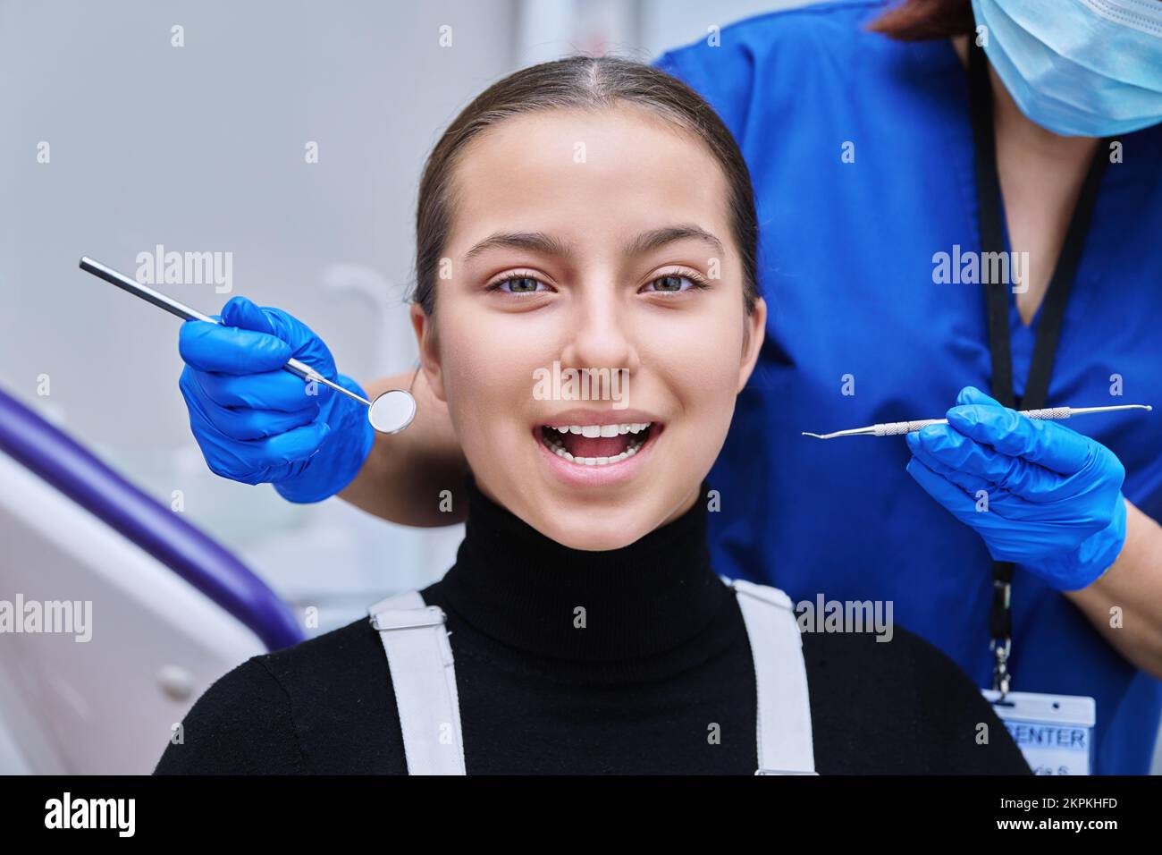 Young teenage female on dental examination treatment in clinic Stock Photo Alamy