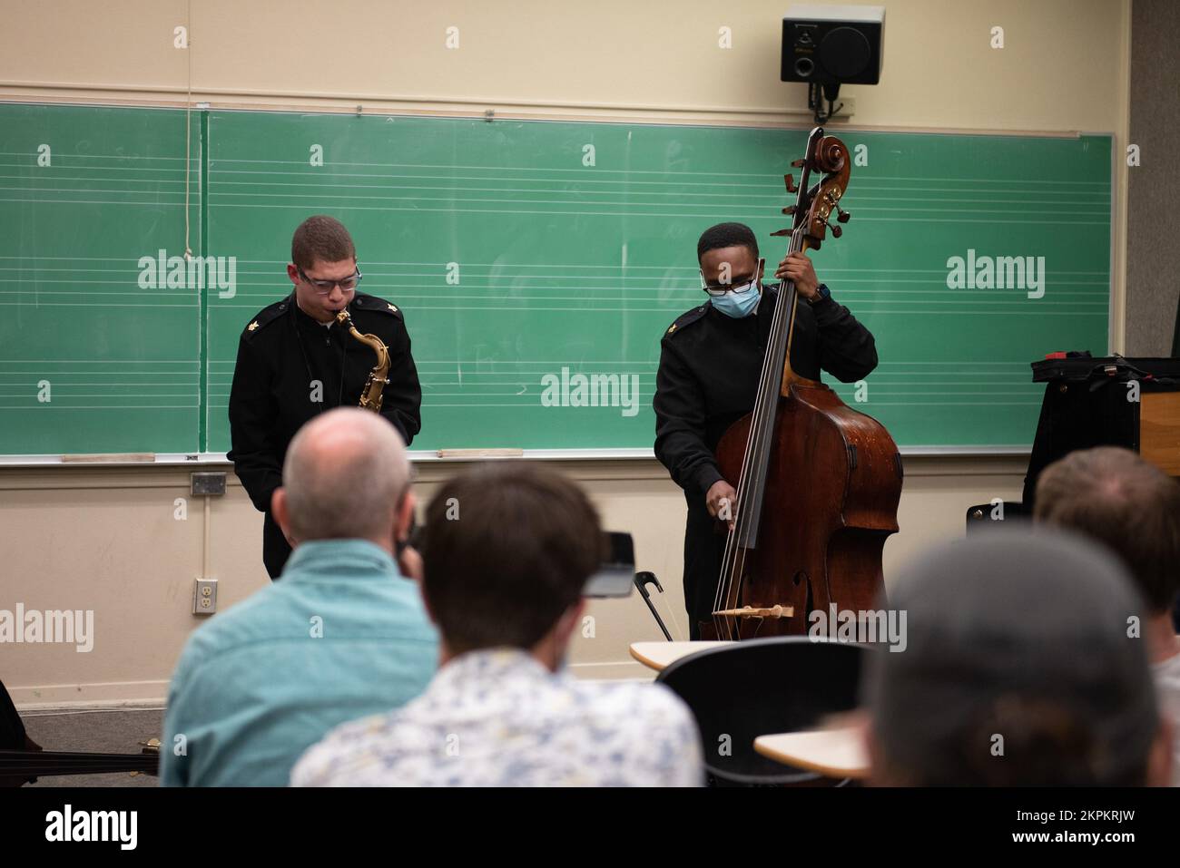 221027-N-PG545-1036, Denton, Texas (Nov.1, 2022) Musicians 1st Class William Ledbetter and Justin Mendez perform a duet during a bass clinic at University of North Texas. In addition to performing public concerts, the Commodores participated in a number of educational outreach events during their national tour. Stock Photo