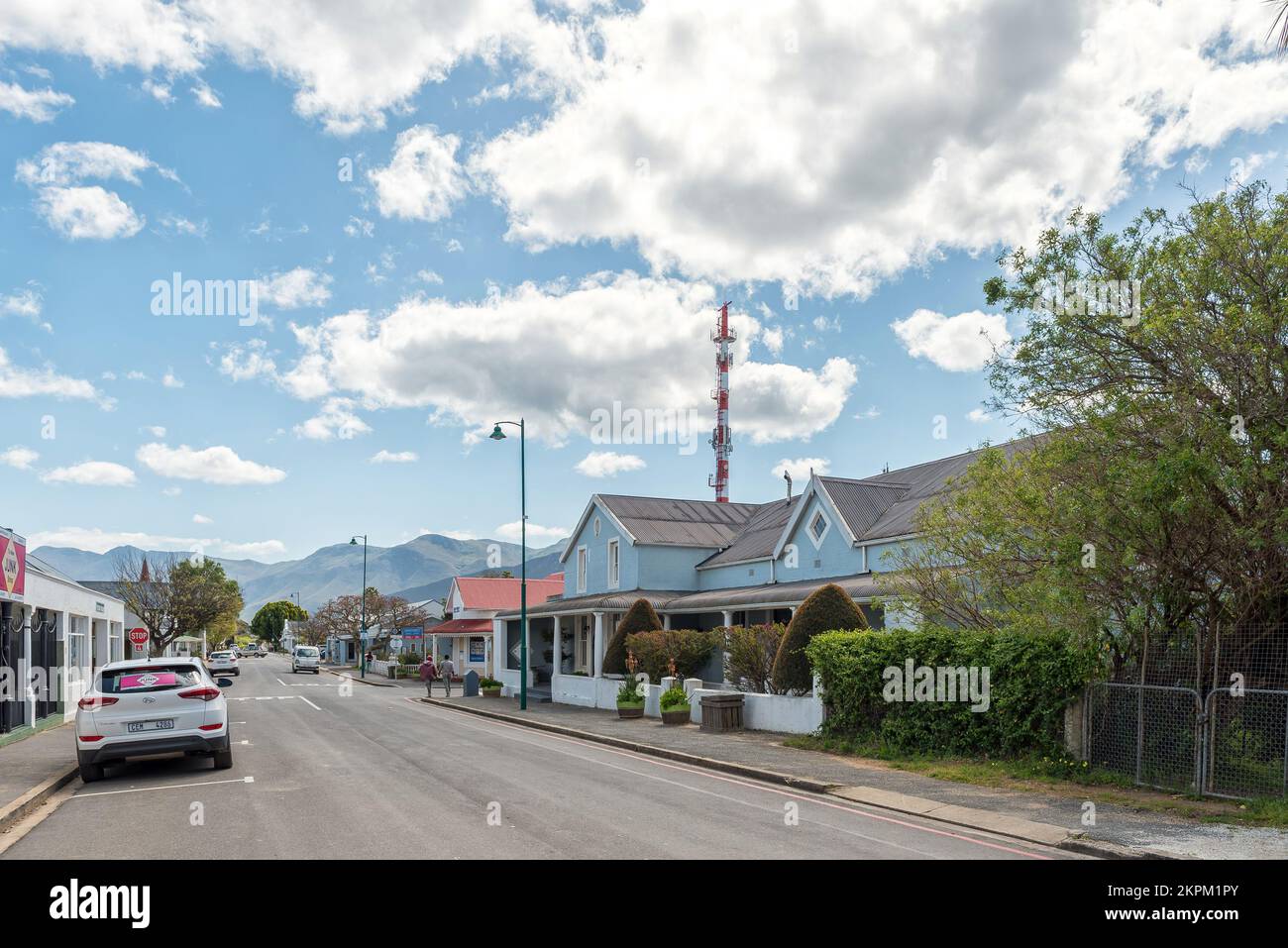 Stanford, South Africa - Sep 20, 2022: A street scene, with houses and businesses, in Stanford in the Western Cape Province Stock Photo