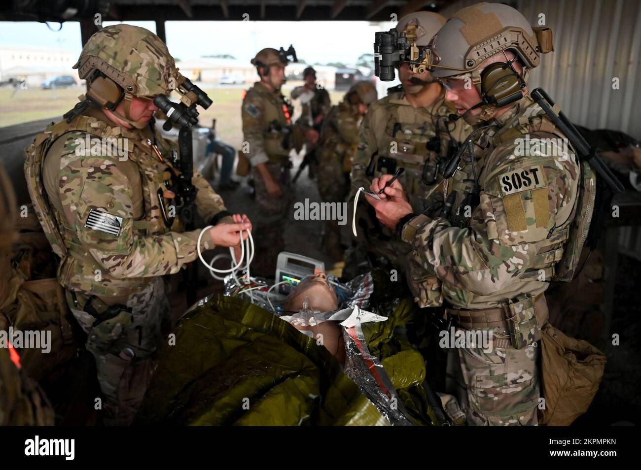 Special Operations Surgical Team members from the 24th Special Operations Wing treats a simulated casualty at a mission support site during a joint Special Operations Forces exercise Nov. 1, 2022, at Eglin Air Force Range, Flor. SOST provides a unique expeditionary battlefield surgery capability to support multi-service SOF activities around the world. Stock Photo