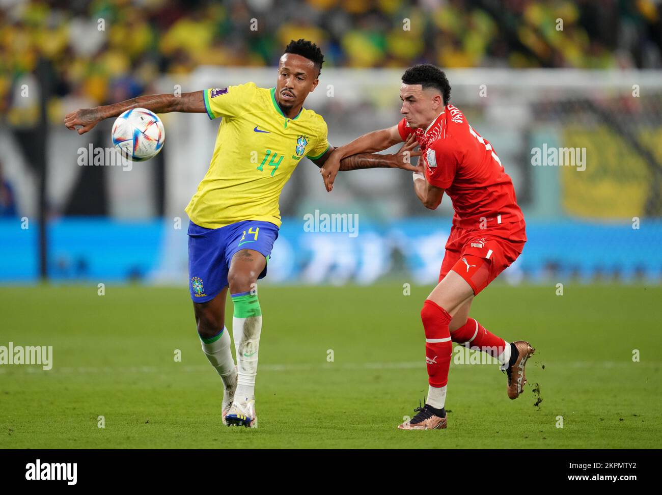 Brazil's Eder Militao (left) and Switzerland's Ruben Vargas battle for the ball during the FIFA World Cup Group G match at Stadium 974 in Doha, Qatar. Picture date: Monday November 28, 2022. Stock Photo