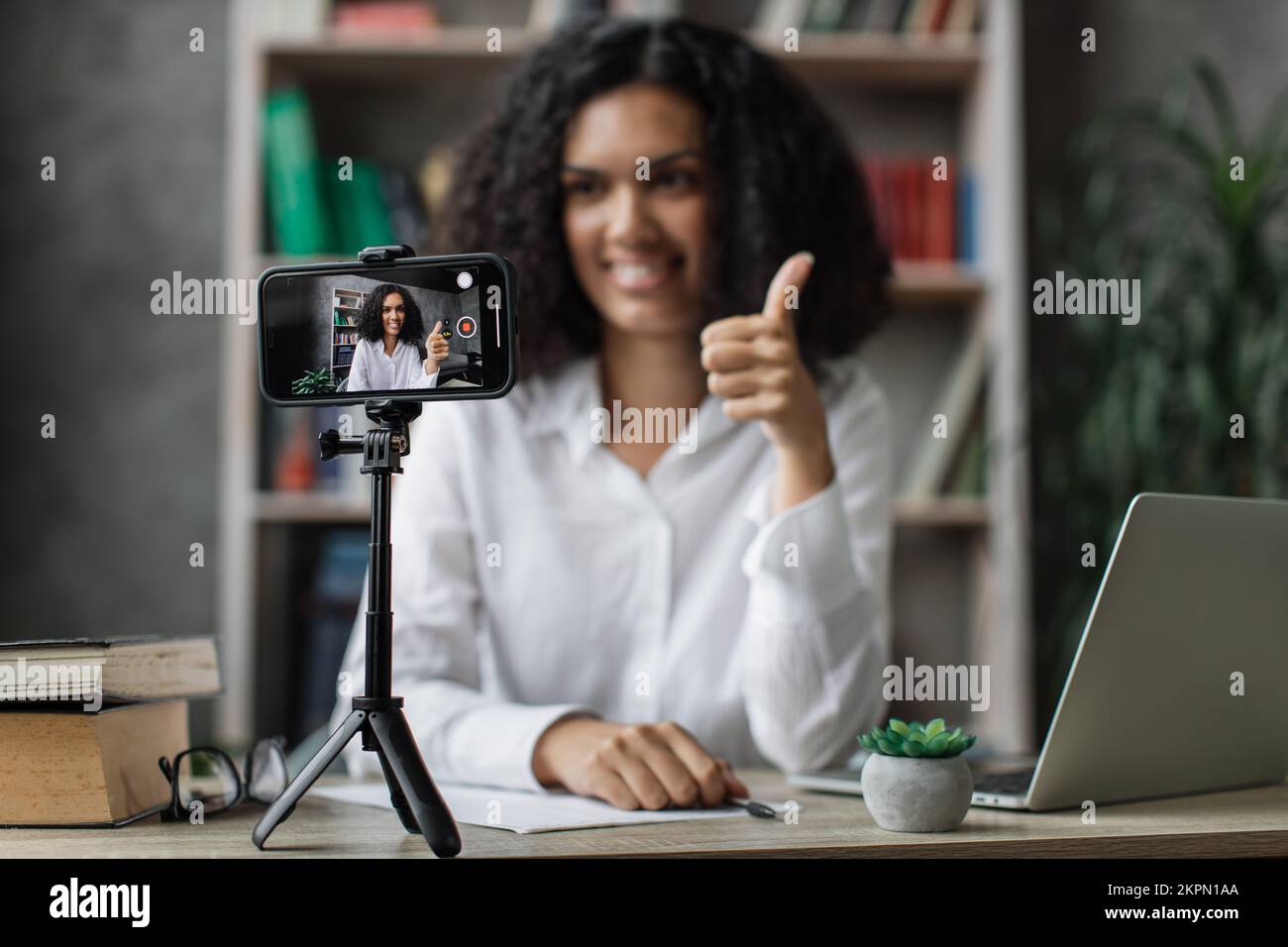 Woman blogger showing thumb hi-res stock photography and images - Alamy