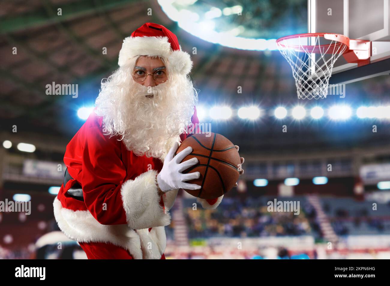 Santa claus ready to play basketball for Christmas Stock Photo - Alamy