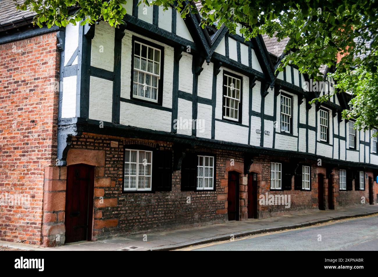 Black-and-white Revival timber frame terraced house in the English town of Chester. Stock Photo