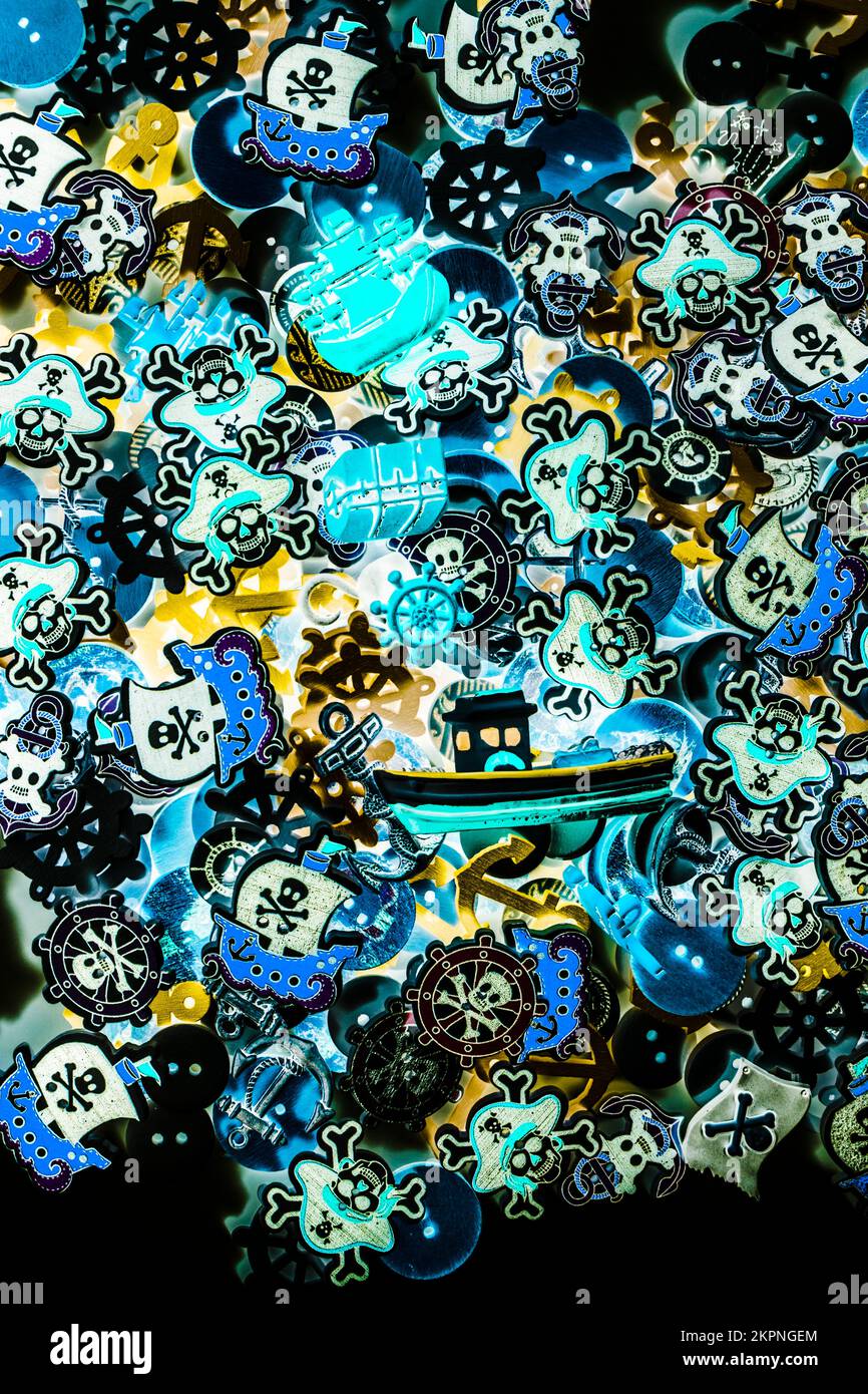 Seafaring abstract of pirate buttons and nautical motifs in inverse creativity Stock Photo