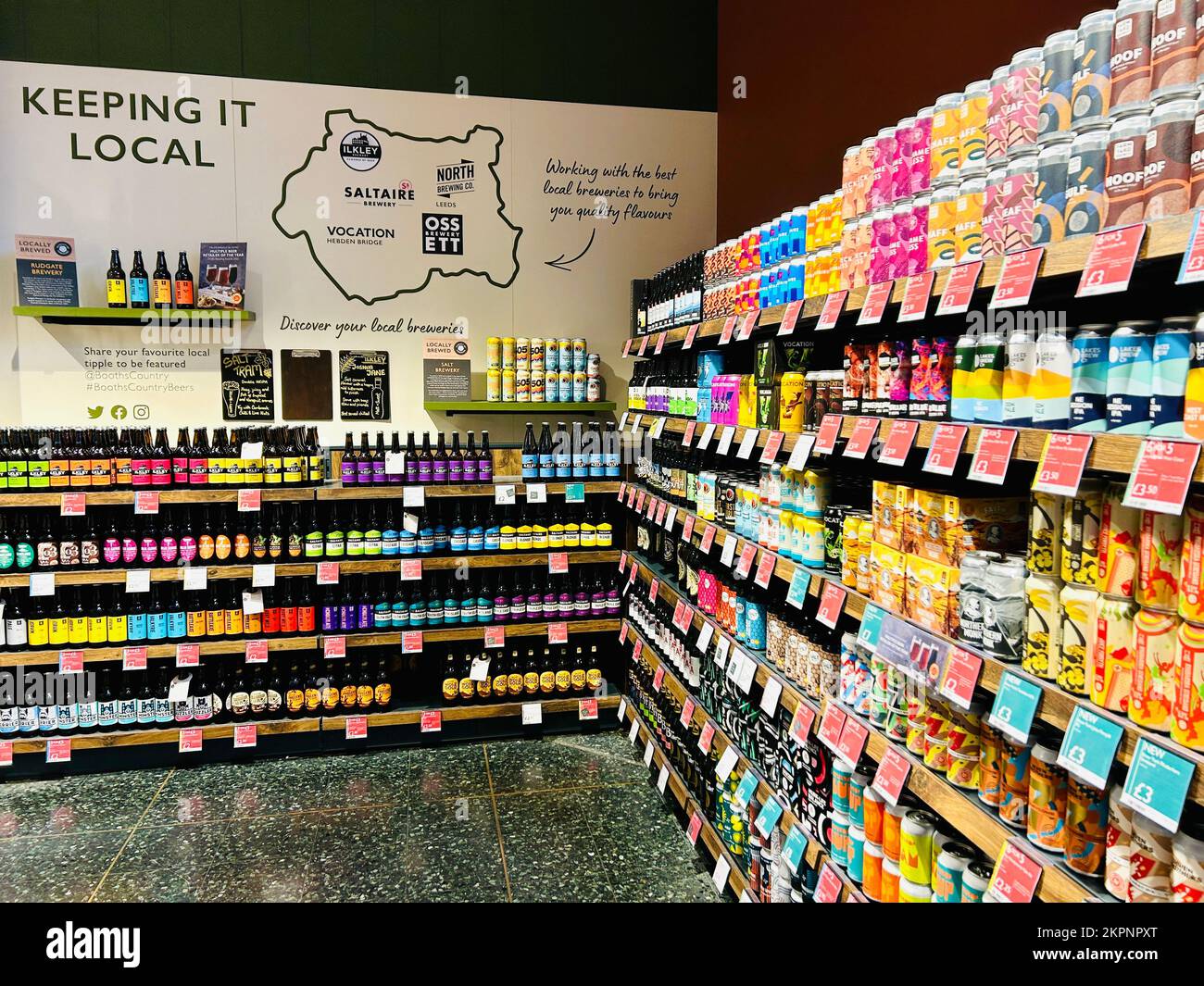 Alcohol aisle at Booths Supermarket, Ilkley. Shelves full of alcoholic